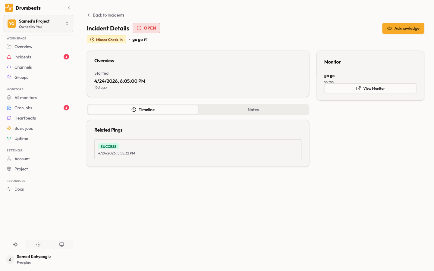 The incident detail page in Drumbeats with the OPEN status badge, Missed Check-in event type, Acknowledge button, Overview card with start time, and the Timeline / Notes tabs