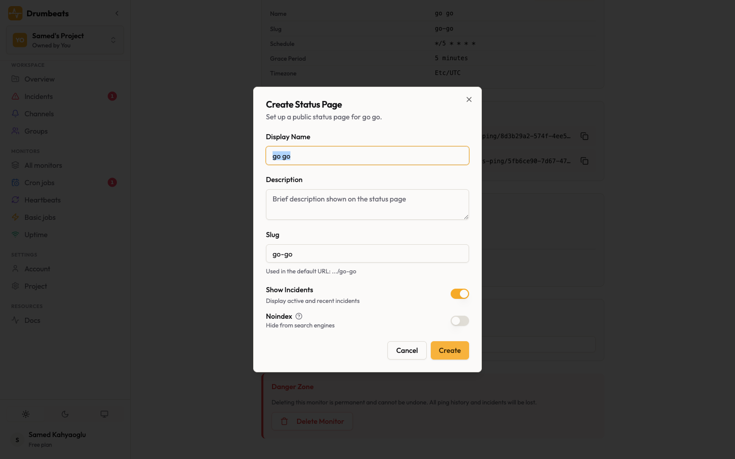 The Create Status Page dialog for a Cron monitor, with display name, description, slug, Show Incidents toggle, and Noindex toggle